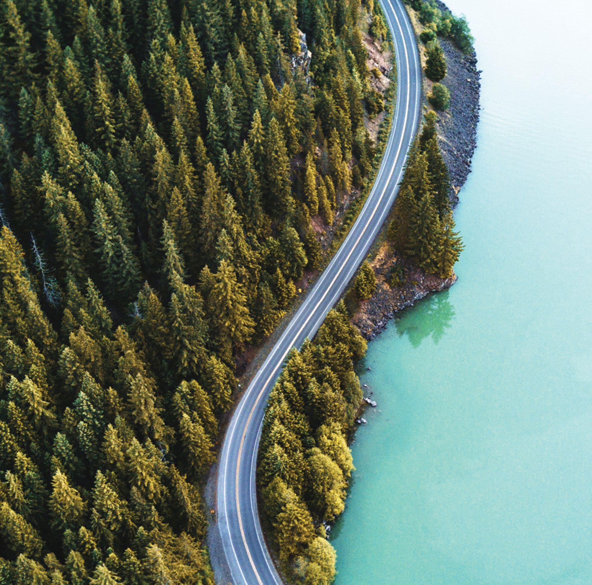 car driving down road 